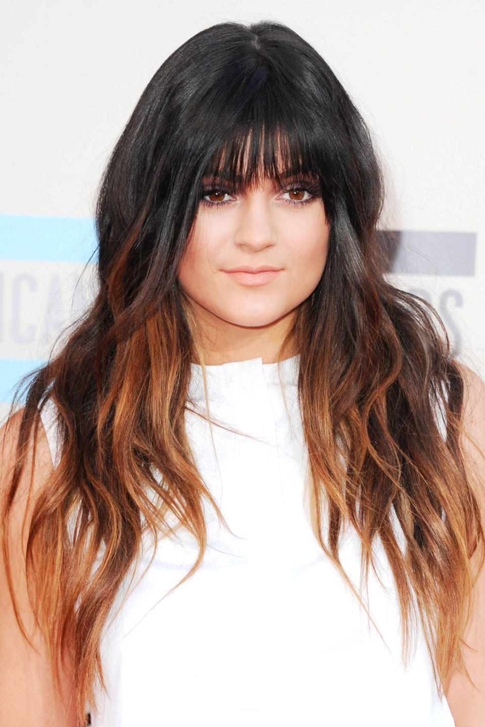 <p>Extra long, fringed and balayaged at the 2013 American Music Awards on November 24, 2013.</p>