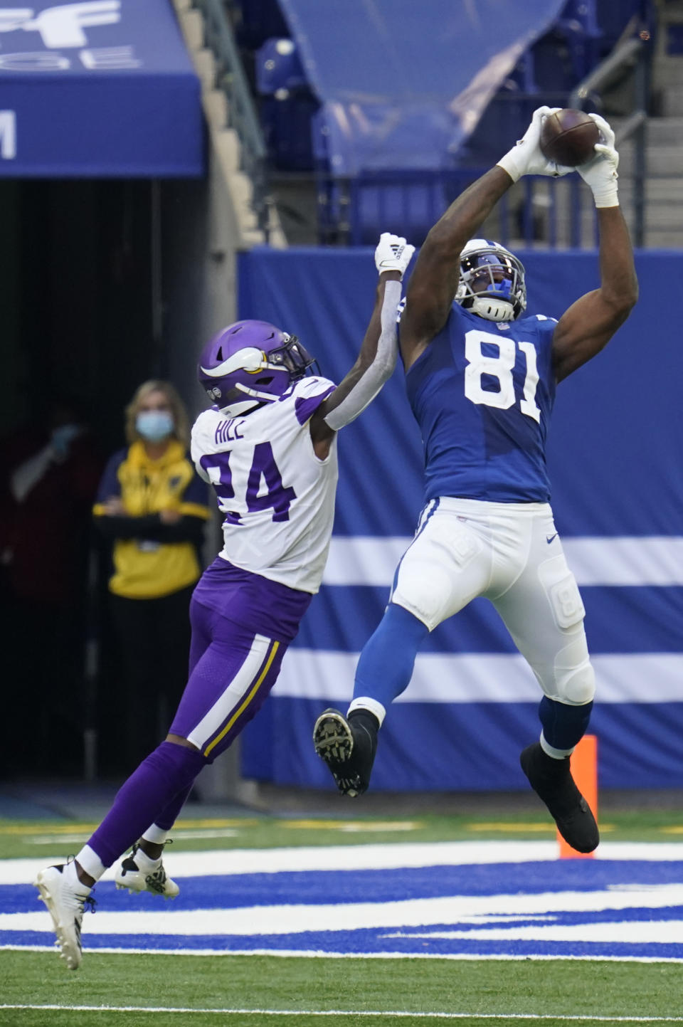 Indianapolis Colts tight end Mo Alie-Cox (81) makes a catch against Minnesota Vikings' Holton Hill (24) during the second half of an NFL football game, Sunday, Sept. 20, 2020, in Indianapolis. (AP Photo/Michael Conroy)