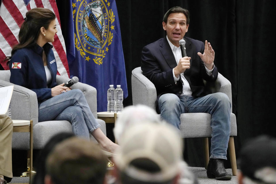 Republican presidential candidate Florida Gov. Ron DeSantis, right, addresses a gathering with his wife Casey during a campaign event, Thursday, June 1, 2023, in Rochester, N.H. (AP Photo/Charles Krupa)