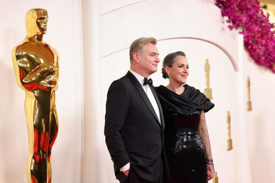 Christopher Nolan and Emma Thomas  arrive for the Academy Awards.