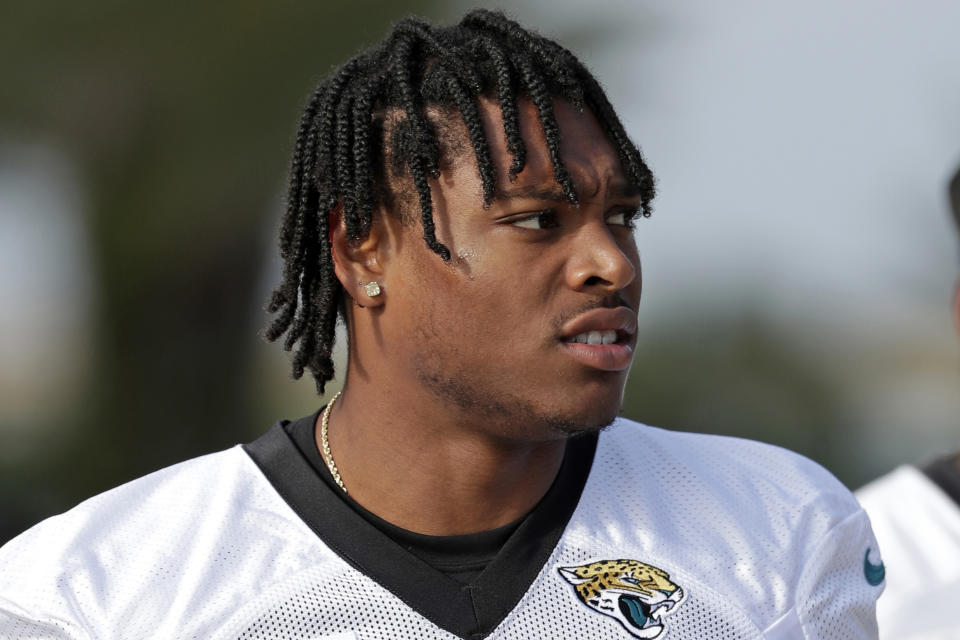 FILE - In this June 11, 2019, file photo, Jacksonville Jaguars cornerback Jalen Ramsey walks to the field for an NFL football practice in Jacksonville, Fla. Two-time Pro Bowl cornerback Jalen Ramsey has requested a trade following a sideline argument with Jacksonville Jaguars coach Doug Marrone. The Jags are willing to entertain offers. Ramsey's agent asked the Jags to move the disgruntled defender after Ramsey and Marrone got into a heated exchange during the team's 13-12 loss at Houston, according to a person with knowledge of the situation. The person spoke to The Associated Press on the condition of anonymity Monday, Sept. 17, 2019, because neither Ramsey nor the team had made the request public. (AP Photo/John Raoux, File)