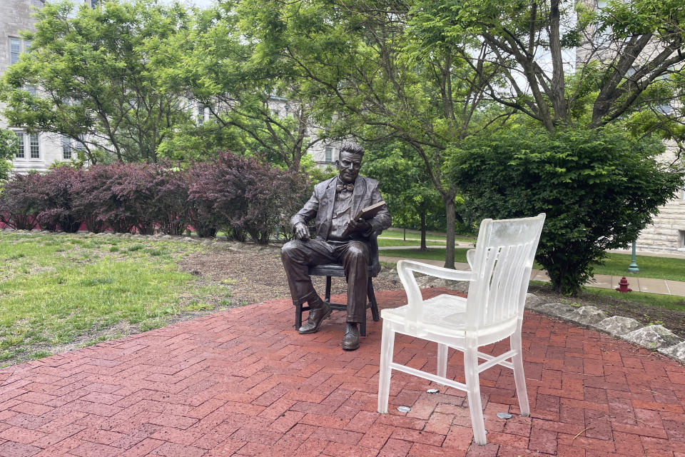 A bronze sculpture of Alfred Kinsey, a sex researcher who founded Indiana University's branch of sex research, the Kinsey Institute, sits outside the institute's research facility, Tuesday, May 16, 2023, in Bloomington, Ind. (AP Photo/Arleigh Rodgers)