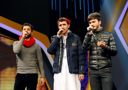 Afghan singer Abdul Salam Maftoon, 28, (C) performs during rehearsals in the "Afghan Star" talent show at Tolo television studio in Kabul, Afghanistan January 16, 2019. REUTERS/Mohammad Ismail