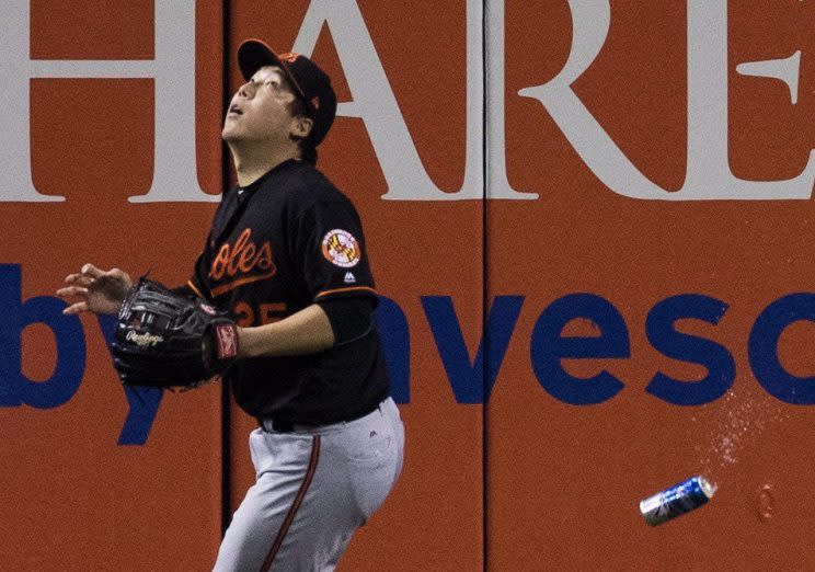 Hyun Soo Kim was nearly hit by a thrown beer can in the AL wild-card game. (The Canadian Press via AP)