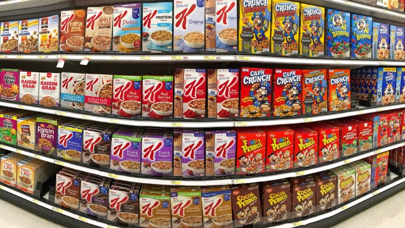 A store shelf full of sugary cereals. New FDA nutrition label rules will mean some of these products lose the "healthy" label.