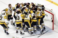 <p>Pittsburgh Penguins players celebrate after defeating the Nashville Predators Game 6 of the 2017 Stanley Cup Final at Bridgestone Arena. Credit: Aaron Doster-USA TODAY Sports </p>