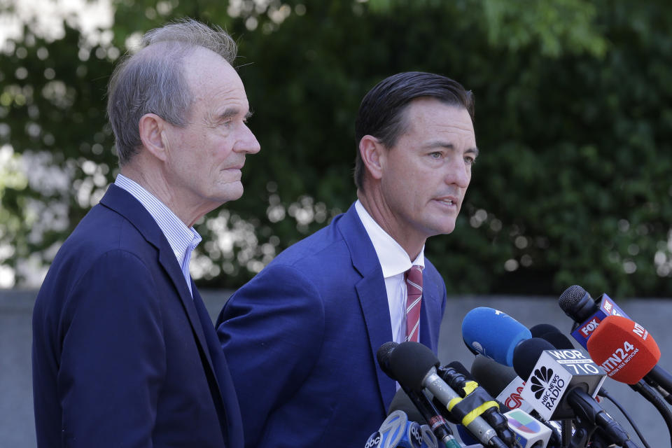 Attorneys David Boies, left and Brad Edwards speak to reporters outside the courthouse in New York, Monday, July 15, 2019. Financier Jeffrey Epstein will remain behind bars for now as a federal judge mulls whether to grant bail on charges he sexually abused underage girls. (AP Photo/Seth Wenig)
