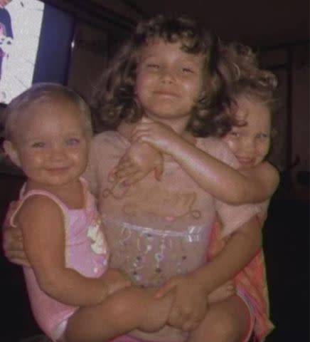 <p>Tricia Hess, family photos</p> Baby Chloe with two sisters.