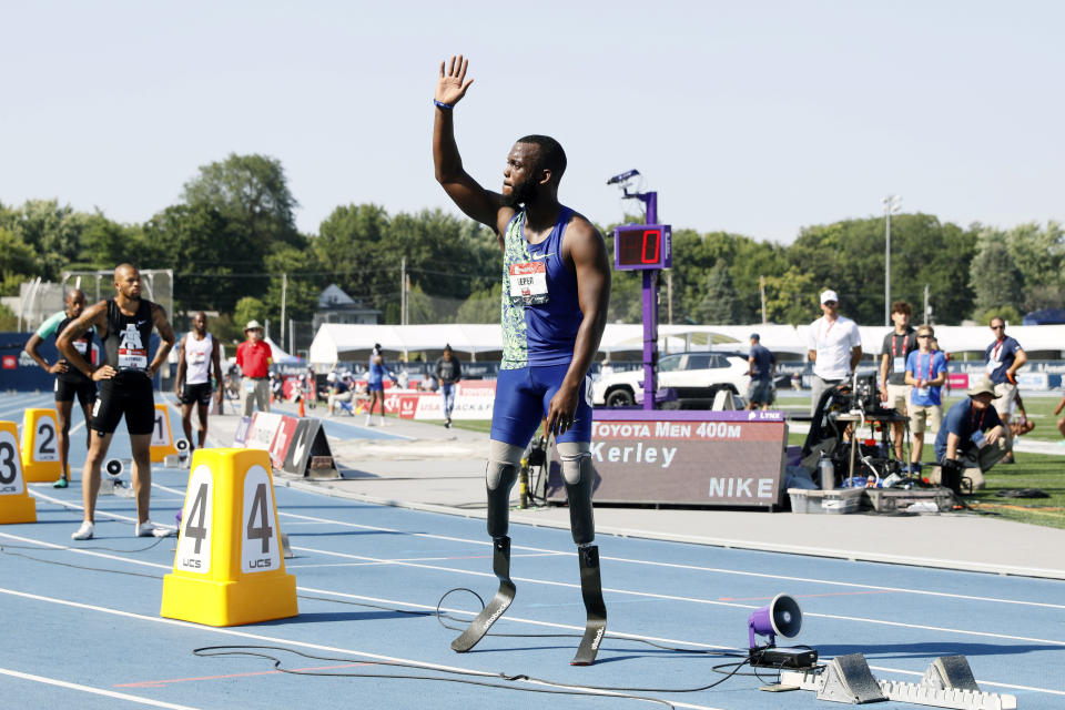 Blake Leeper waves to the crowd before the men's 400-meter dash at the U.S. Championships athletics meet, Saturday, July 27, 2019, in Des Moines, Iowa. (AP Photo/Charlie Neibergall)
