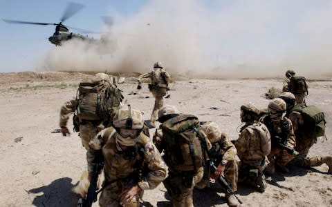 Archive image of soldiers from the The Royal Welch Fusiliers mounting helicopter-borne Eagle VCP's (Vehicle Check Points) around the southern Iraqi town of Basra. July 2, 2004. - Credit: Getty Images Europe