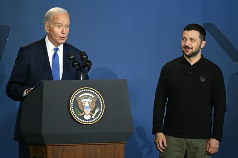 US President Joe Biden corrected himself after accidentally introducing Ukraine's President Volodymyr Zelensky (R) as Russia's President Vladimir Putin during the Ukraine Compact initiative on the sidelines of the NATO summit in Washington (Brendan SMIALOWSKI)