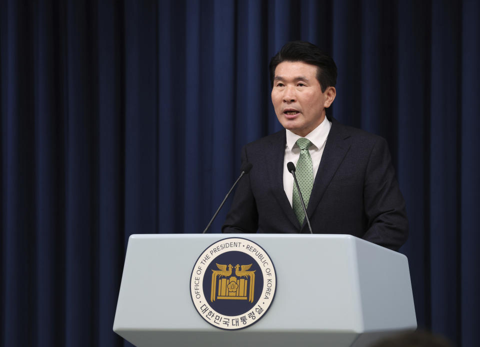 South Korea's presidential office's senior secretary for civil and social affairs Hwang Sang Moo briefs at the presidential office in Seoul, South Korea, Monday, Jan. 22, 2024. South Korea’s presidential office said Monday it approved a request by the country’s Truth and Reconciliation Commission to extend its term by a year through late-May 2025. Investigators had been calling for more time to examine a broad range of human rights violations linked to Seoul’s past military governments, including a widespread falsifying of child origins that fueled a government-backed foreign adoption boom in the 1970s and '80s. (Jin Sung-chul/Yonhap via AP)