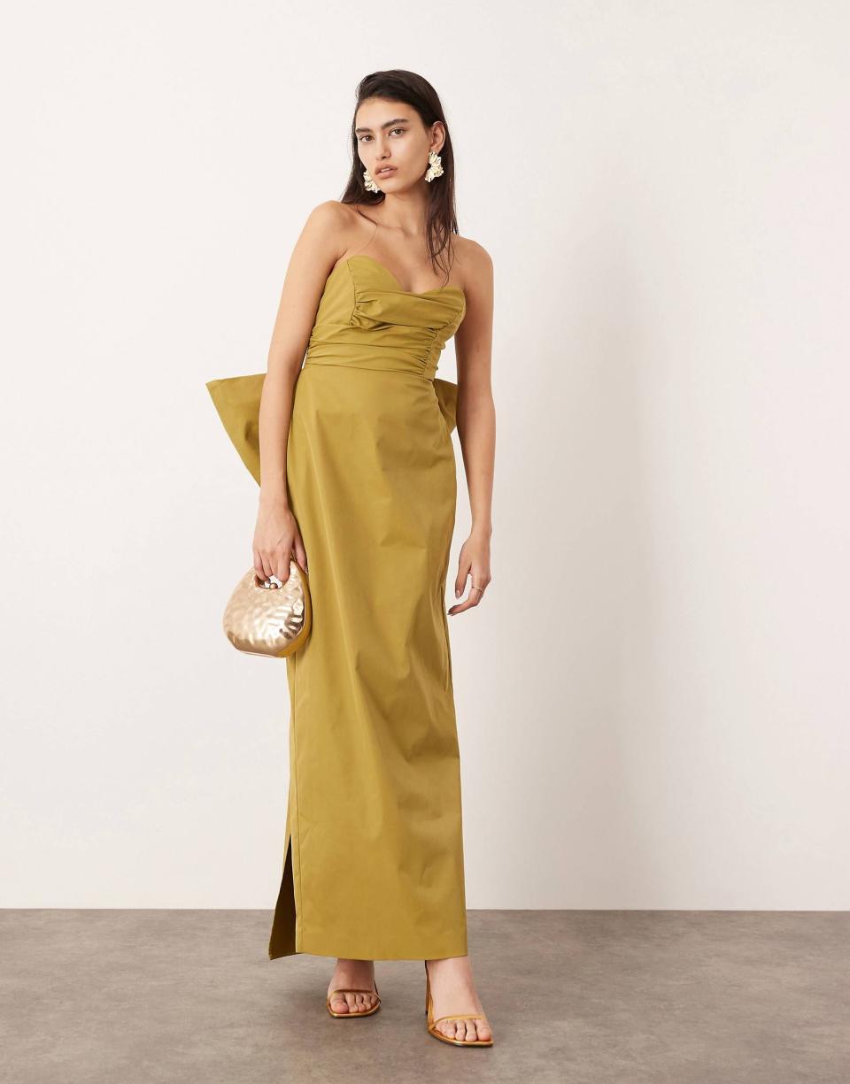 <p><a href="https://go.redirectingat.com?id=74968X1596630&url=https%3A%2F%2Fwww.asos.com%2Fus%2Fasos-edition%2Fasos-edition-bandeau-maxi-dress-with-large-bow-in-green%2Fprd%2F205709010&sref=https%3A%2F%2Fwww.cosmopolitan.com%2Fstyle-beauty%2Ffashion%2Fa60897414%2Fwhat-is-semi-formal-wedding-attire%2F" rel="nofollow noopener" target="_blank" data-ylk="slk:Shop Now;elm:context_link;itc:0;sec:content-canvas" class="link ">Shop Now</a></p><p>Bandeau Maxi Dress with Large Bow</p><p>us.asos.com</p><p>$229.00</p>