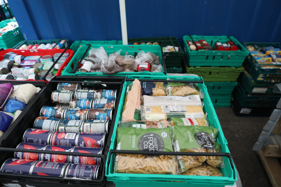 File photo dated 03/03/21 of food laid out in crates at a food bank in north London. The cost of food is a 