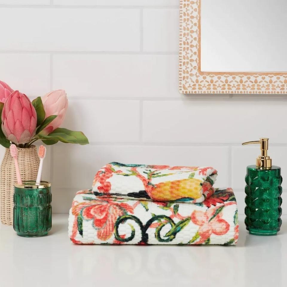 Folded floral towels on a counter