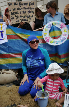 Protesters demonstrate against France's ban of the burkini, outside the French Embassy in London, Britain August 25, 2016. REUTERS/Neil Hall