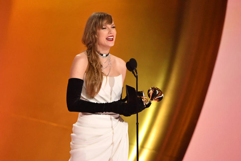 Taylor Swift accepts the Best Pop Vocal Album award at the Grammy Awards.