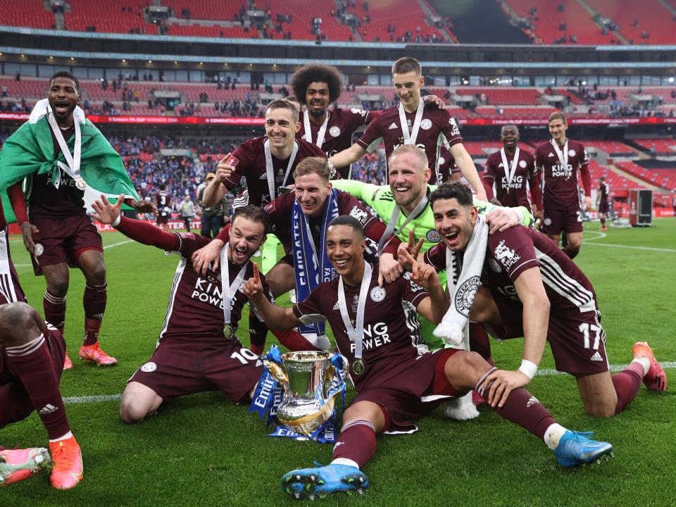 Leicester City players celebrate with the FA Cup trophy (Getty)