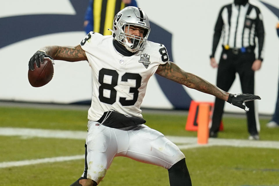 Las Vegas Raiders tight end Darren Waller (83) celebrates after scoring a 2-point conversion against the Denver Broncos during the second half of an NFL football game, Sunday, Jan. 3, 2021, in Denver. (AP Photo/Jack Dempsey)