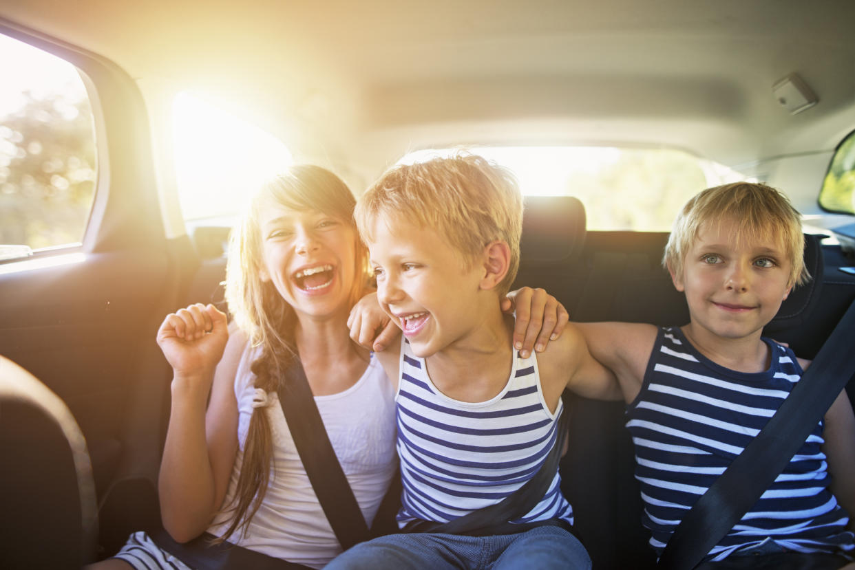 A third of parents are breaking the law when transporting someone else's child in the car [Photo: Getty]