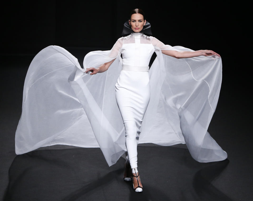 A model wears a creation by French fashion Stephane Rolland's Haute Couture Fall-Winter 2013-2014 collection presented Tuesday, July 2, 2013 in Paris. (AP Photo/Francois Mori)