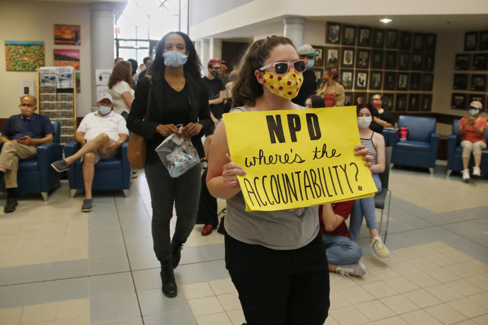 Protesters arrive at a Norman City Council meeting on June 9, 2020, to present a list of demands to the council which included defunding the police. (Sue Ogrocki / AP file)