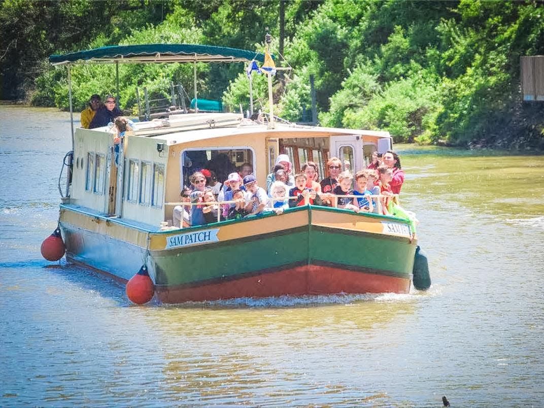 The Sam Patch cruises the Erie Canal out of Schoen Place in the village of Pittsford.