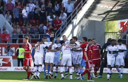 Football Soccer - FC Ingolstadt 04 v Bayern Munich - German Bundesliga - Audi Sportpark, Ingolstadt, Germany 07/05/16 Players of Bayern Munich celebrate victory after match. REUTERS/Michaela Rehle.