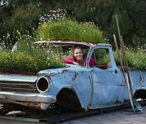 Kings Park Events Officer Kelly Meacock behind the driver's wheel of the parks newest wildflower display. Picture: Mogens Johansen/The West Australian