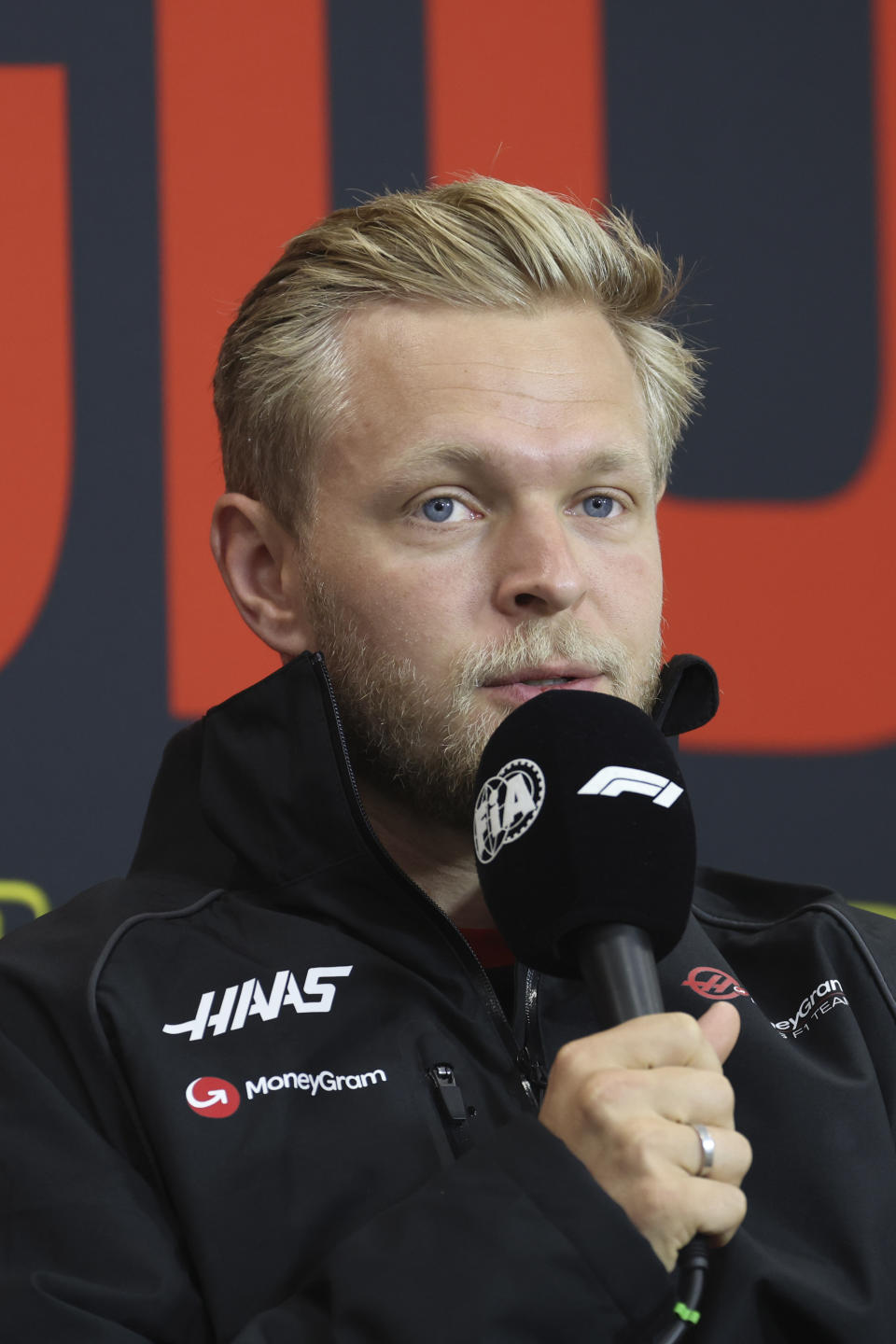 Haas driver Kevin Magnussen of Denmark participates in a media conference ahead of the Formula One Grand Prix at the Spa-Francorchamps racetrack in Spa, Belgium, Thursday, July 27, 2023. The Belgian Formula One Grand Prix will take place on Sunday. (AP Photo/Geert Vanden Wijngaert)