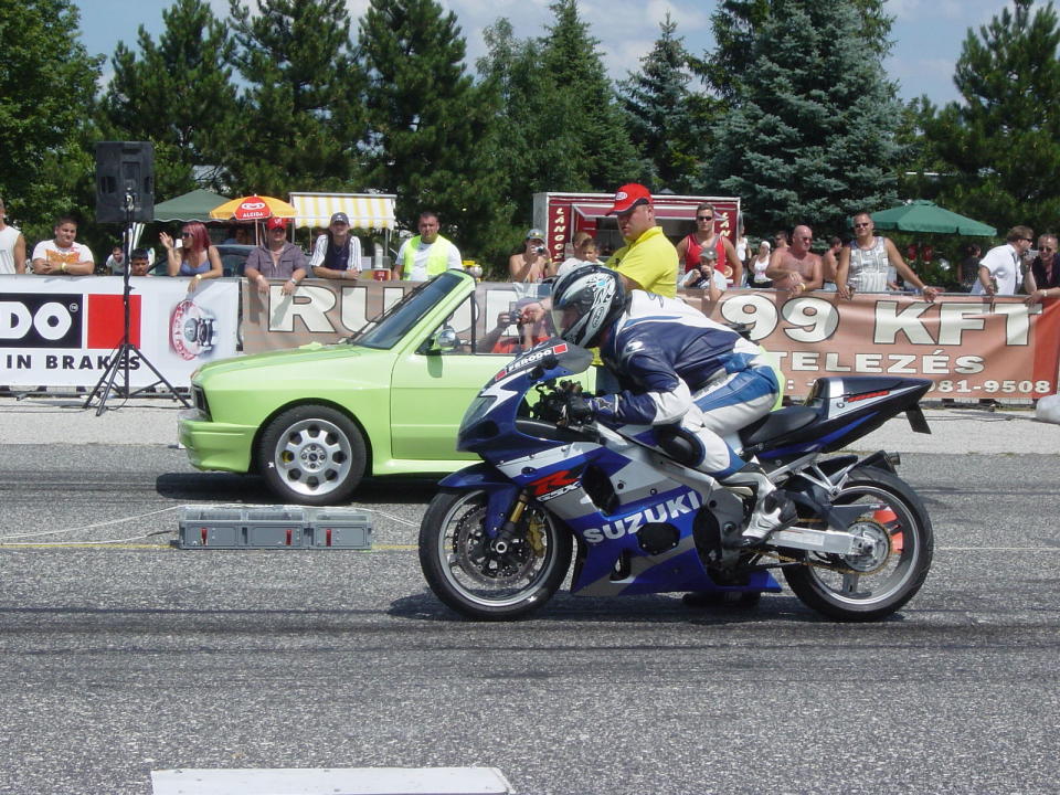 Photo - "Zastava Yugo 55 vs Motorcycle - Flickr - jns001" by János Tamás - Zastava Yugo 55 vs Motorcycle. 