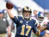 Oct 23, 2016; London, United Kingdom; Los Angeles Rams quarterback Case Keenum (17) of the recovers a fumble and looks downfield to pass against the New York Giants during the second quarter of the game at Twickenham Stadium. Mandatory Credit: Steve Flynn-USA TODAY Sports