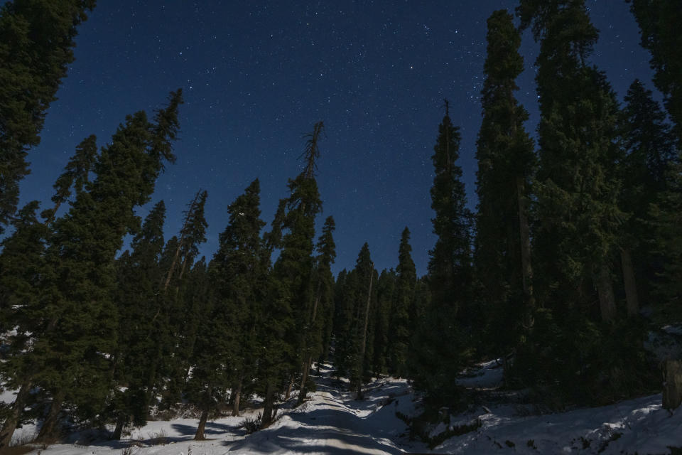 Stars light up the sky in Drang village northwest of Srinagar, Indian controlled Kashmir Thursday, Dec. 21, 2023. This is the time of "Chillai Kalan," also called "The Great Winter," a Kashmiri phrase which defines the harshest 40 days of cold in disputed Kashmir that commence in late December and extend into January and early February. (AP Photo/Dar Yasin)