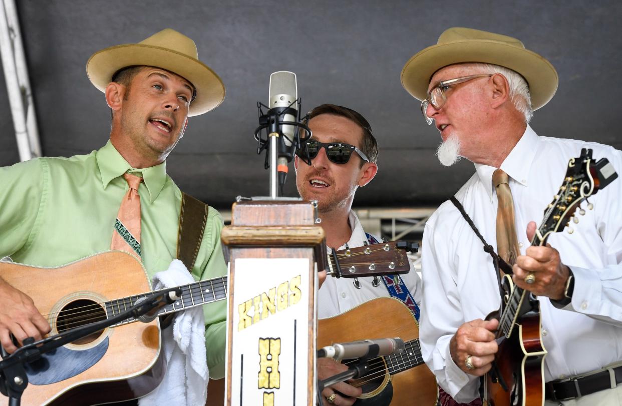 Left to right, Josh Johnston, Zeb Hargis and Mark Hargis with Henderson’s own Kings Highway opens the 34th annual Bluegrass in the Park/Folklife Festival in Audubon Mill Park Friday evening, August 9, 2019.