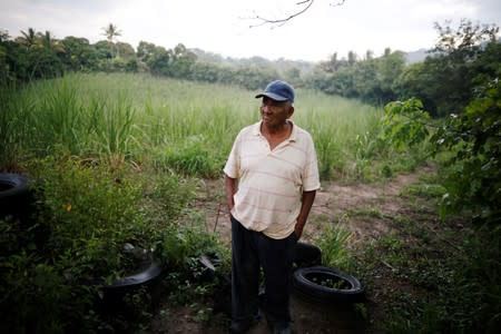 Victor Gonzalez, father of Salvadoran migrant Marvin Antonio Gonzalez, who recently died in a border detention center in New Mexico, is pictured outside his home in Verapaz