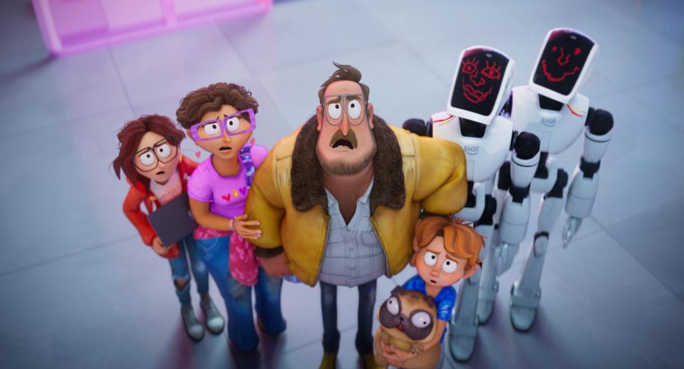 The Mitchell family - Katie (far left, voiced by Abbi Jacobson), Linda (Maya Rudolph), Rick (Danny McBride) and Aaron (director Mike Rianda) - team up with screwed-up robots Deborahbot 5000 (Fred Armisen) and Eric (Beck Bennett) in the animated comedy "The Mitchells vs. the Machines."