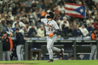 Detroit Tigers' Javier Baez celebrates while rounding the bases after hitting a two-run home run off Seattle Mariners starting pitcher George Kirby during the third inning of a baseball game, Monday, Oct. 3, 2022, in Seattle. (AP Photo/Stephen Brashear)