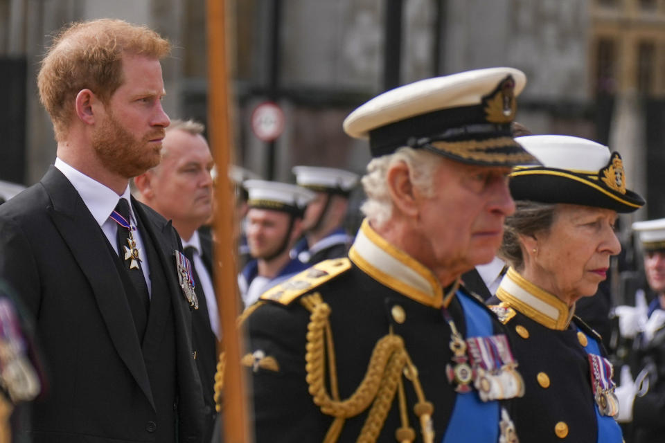 King Charles III, the Princess Royal and the Duke of Sussex (back left) follow the State Gun Carriage carrying the coffin of Queen Elizabeth II, draped in the Royal Standard with the Imperial State Crown and the Sovereign's orb and sceptre, as it leaves Westminster Hall for the State Funeral at Westminster Abbey, London. Picture date: Monday September 19, 2022.