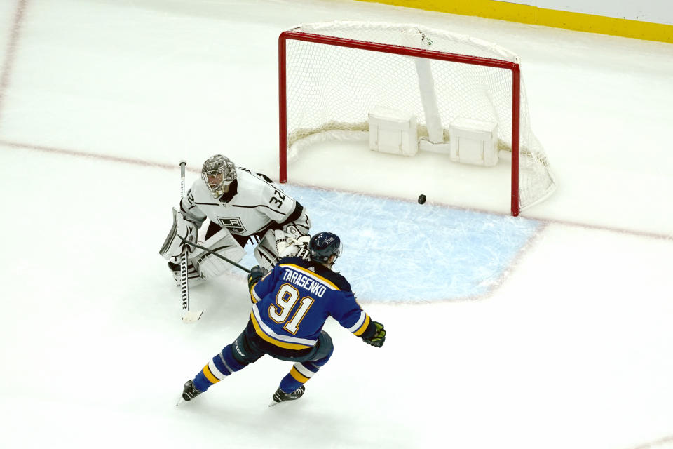 St. Louis Blues' Vladimir Tarasenko (91) scores past Los Angeles Kings goaltender Jonathan Quick during the third period of an NHL hockey game Monday, Oct. 25, 2021, in St. Louis. (AP Photo/Jeff Roberson)