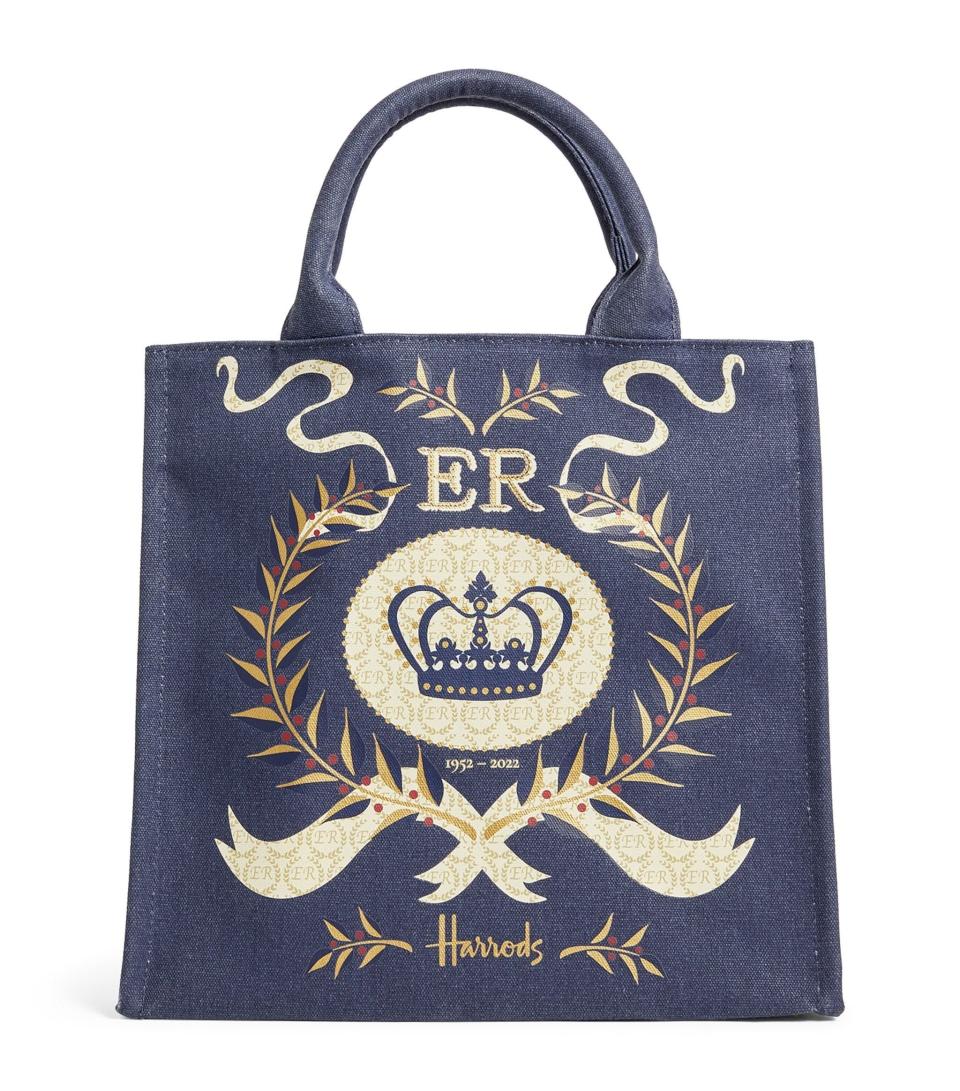 <p>harrods.com</p><p><strong>$33.00</strong></p><p><a href="https://go.redirectingat.com?id=74968X1596630&url=https%3A%2F%2Fwww.harrods.com%2Fen-us%2Fshopping%2Fsmall-queens-platinum-jubilee-shopper-bag-17481200&sref=https%3A%2F%2Fwww.townandcountrymag.com%2Fsociety%2Ftradition%2Fg39825639%2Fplatinum-jubilee-souvenirs-gifts%2F" rel="nofollow noopener" target="_blank" data-ylk="slk:Shop Now;elm:context_link;itc:0;sec:content-canvas" class="link ">Shop Now</a></p><p>The eco-friendliness of carrying your own shopping bag, mixed with the sophistication of Queen Elizabeth. </p>