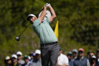 Jon Rahm, of Spain, tees off on the fifth hole during the final round at the Masters golf tournament on Sunday, April 10, 2022, in Augusta, Ga. (AP Photo/Jae C. Hong)