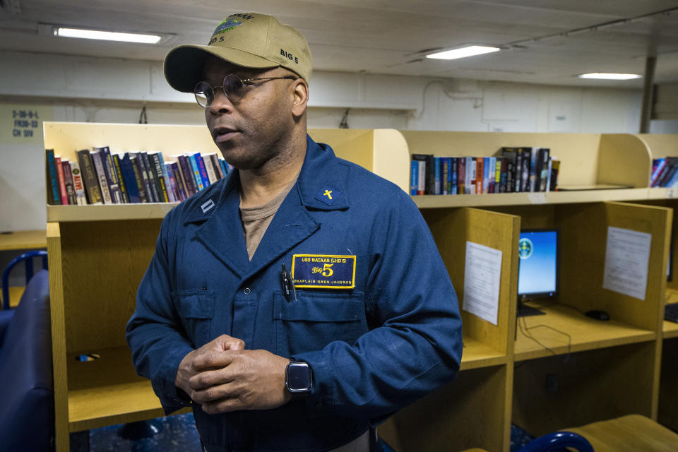 Navy Chaplain Lt. Greg Johnson, speak about the his role aboard the USS Bataan on Tuesday, March 14, 2023. Johnson, who joined the Bataan in December, says “A lot of people have resiliency. They just don’t know how to tap into it.” Navy chaplains are required to minister to all sailors no matter their religious affiliation and provide complete confidentiality whatever the sailor speaks on. (AP Photo/John C. Clark)