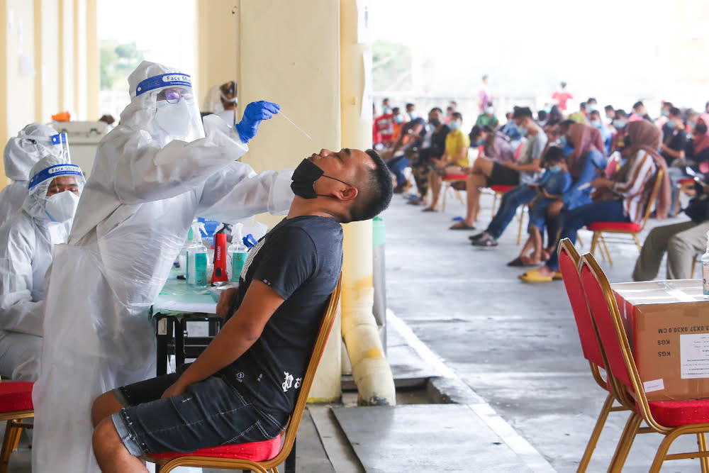 Health officers conduct the Covid-19 antigen rapid test at Laurent Bleu, CMC Centre Cheras January 11, 2021. — Picture by Choo Choy May