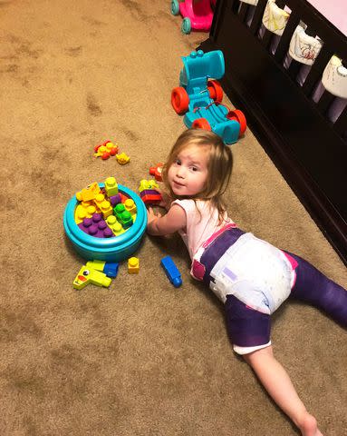 <p>Amelia Zamora</p> Zamora's daughter playing in her cast.