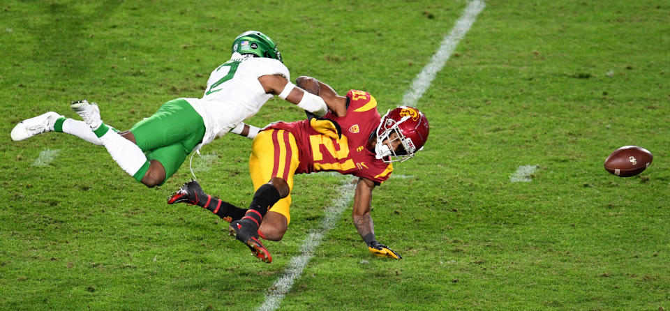 Los Angeles, CA - December 18:  Cornerback Mykael Wright #2 of the Oregon Ducks knocks away a pass intended for wide receiver Tyler Vaughns #21 of the USC Trojans in the third quarter of the PAC 12 Championship football game at the Los Angeles Memorial Coliseum on Friday, December 18, 2020 in Los Angeles on Friday, December 18, 2020. (Photo by Keith Birmingham/MediaNews Group/Pasadena Star-News via Getty Images)