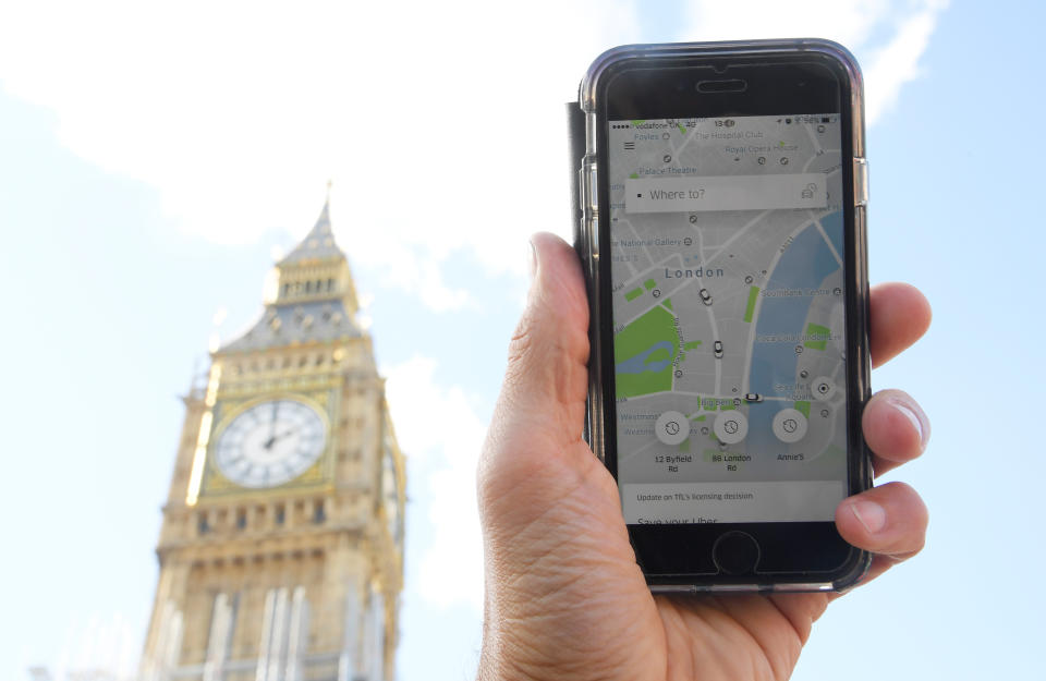 A photo illustration shows the Uber app on a mobile telephone, as it is held up for a posed photograph in central London, Britain September 22, 2017. REUTERS/Toby Melville