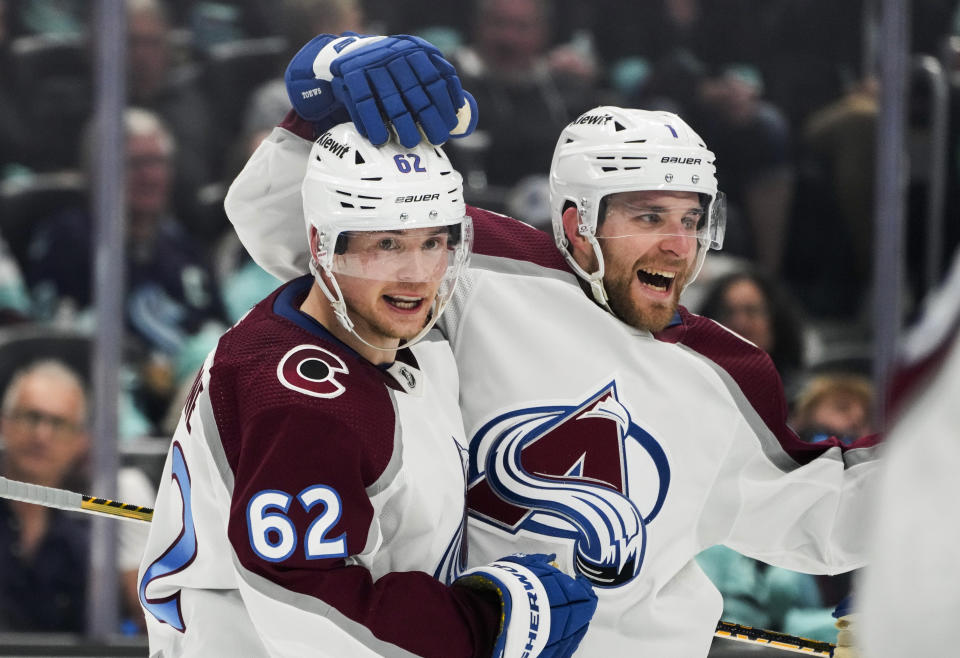 Colorado Avalanche left wing Artturi Lehkonen (62) celebrates his goal against the Seattle Kraken with teammate Devon Toews (7) during the second period of Game 6 of an NHL hockey Stanley Cup first-round playoff series Friday, April 28, 2023, in Seattle. (AP Photo/Lindsey Wasson)