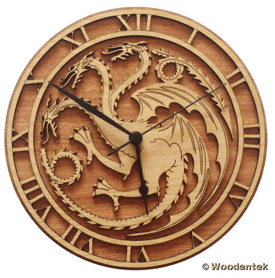 Targaryen Wood Clock Use this clock — featuring a blend of oak and sapele—to count the hours and the minutes until the Mother of Dragons, Daenerys Targaryen, returns to her rightful place on the Iron Throne. Also available in a House Stark edition that merits a place of honor in the halls of Winterfell. After those dastardly Boltons are ejected, of course. Etsy, $33.05 (Credit: Etsy.com)