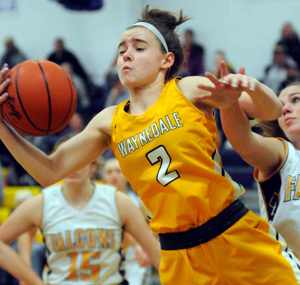 Waynedale's Alyssa Geiser snags a rebound during basketball action between Waynedale and Hillsdale at Hillsdale Thursday December 22,2022 .   Steve Stokes/for Ashland Times-Gazette