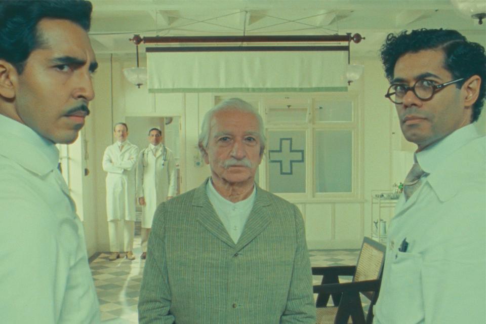 Dev Patel as Dr. Chatterjee, Ben Kingsley as Imdad Khan, and Richard Ayoade as Dr. Marshall in Wes Anderson's 'The Wonderful Story of Henry Sugar'